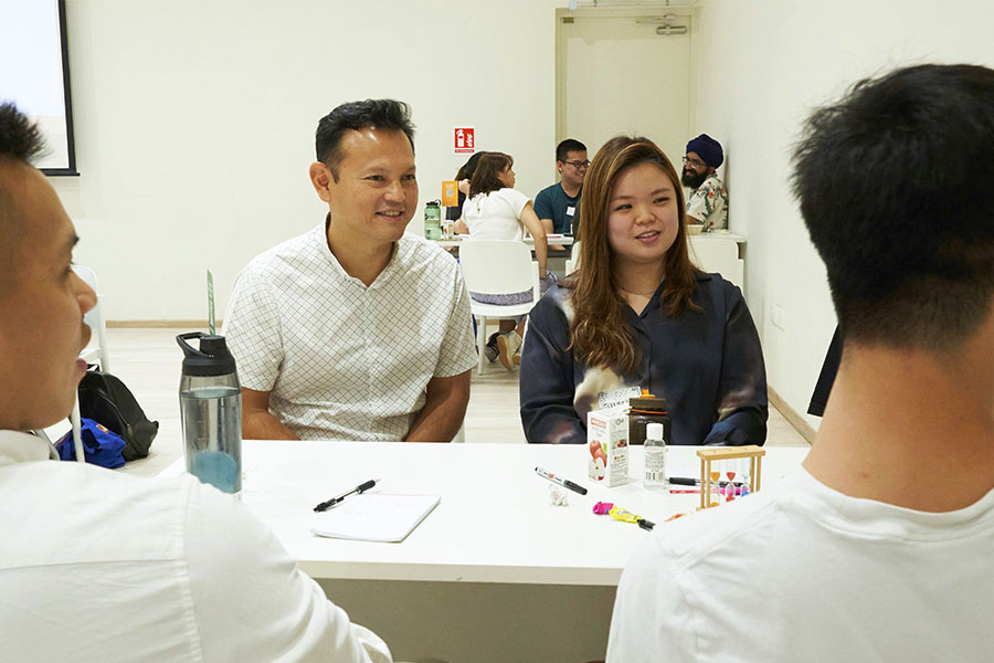 Senior Minister of State Zaqy Mohamad interacting with several youths residing in the North district at the REACH-Friendzone “Singapore_v2050” Conversation session on 17 January 2023.