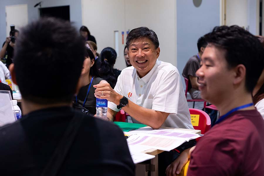 NTUC Secretary-General Ng Chee Meng exchanging views with participants. Credit: MOM