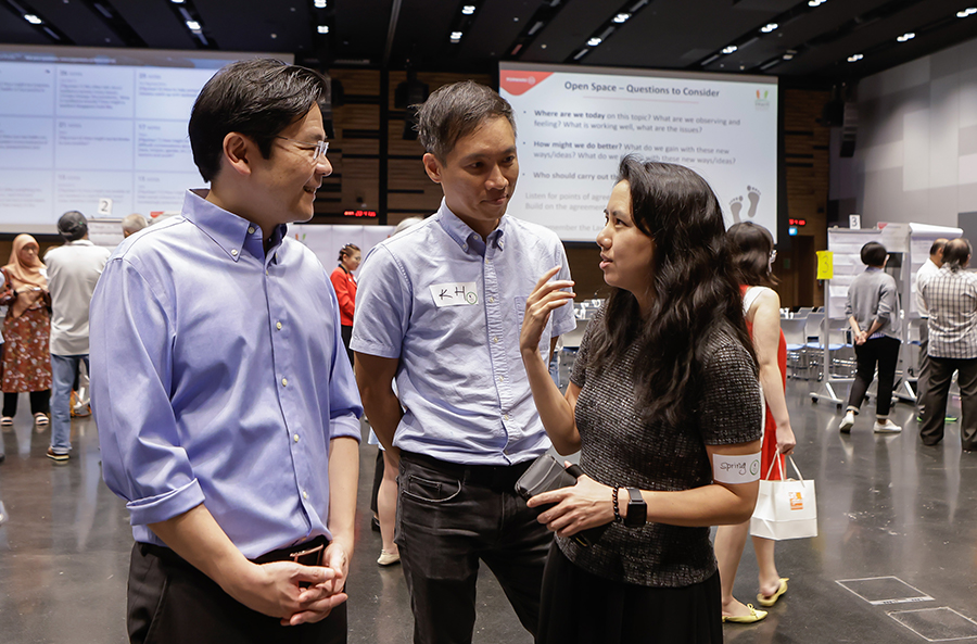 DPM Lawrence Wong speaking to participants on discussion topics at the REACH x Forward Singapore conversations