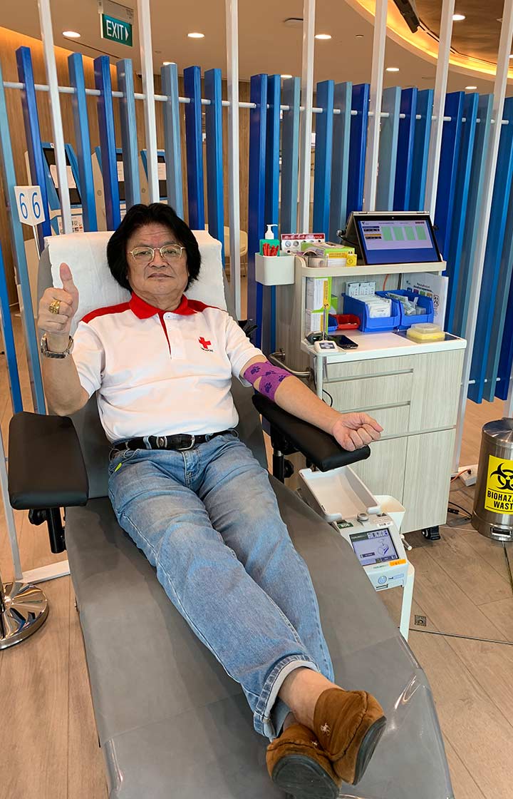 Beyond blood donation, Augustine volunteers tirelessly in other areas with the Singapore Red Cross, from emergency response to community events